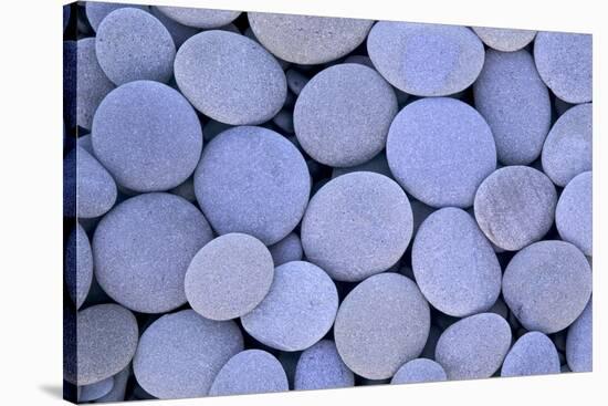 Round and flat grey blue stones along Rialto Beach, Olympic National Park, Washington State-Darrell Gulin-Stretched Canvas