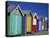 Row of Beach Huts Painted in Bright Colours, Brighton Beach, Near Melbourne, Victoria, Australia-Mawson Mark-Stretched Canvas