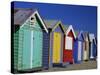 Row of Beach Huts Painted in Bright Colours, Brighton Beach, Near Melbourne, Victoria, Australia-Mawson Mark-Stretched Canvas