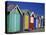 Row of Beach Huts Painted in Bright Colours, Brighton Beach, Near Melbourne, Victoria, Australia-Mawson Mark-Stretched Canvas