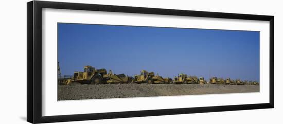 Row of Bulldozers at a Construction Site-null-Framed Photographic Print