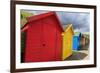 Row of Colourful Beach Huts and their Shadows, with Grassy Cliffs, West Cliff Beach-Eleanor Scriven-Framed Photographic Print