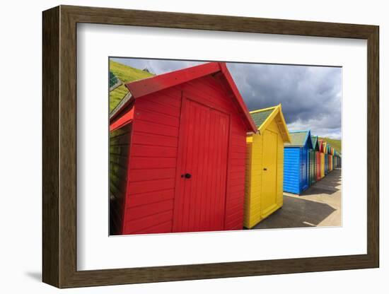 Row of Colourful Beach Huts and their Shadows, with Grassy Cliffs, West Cliff Beach-Eleanor Scriven-Framed Photographic Print