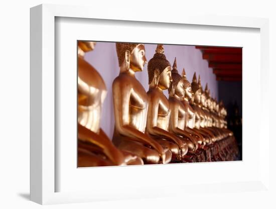 Row of golden Buddha statues, earth witness gesture, Wat Pho (Temple of the Reclining Buddha)-Godong-Framed Photographic Print