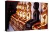 Row of golden Buddha statues, earth witness gesture, Wat Pho (Temple of the Reclining Buddha)-Godong-Stretched Canvas