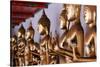 Row of golden Buddha statues, meditation, Wat Pho (Temple of the Reclining Buddha), Bangkok-Godong-Stretched Canvas