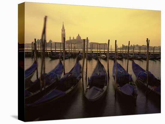 Row of Gondolas at Dawn, San Giorgio Maggiore, Venice, Veneto, Italy, Europe-Jochen Schlenker-Stretched Canvas