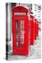 Row Of Iconic London Red Phone Cabins With The Rest Of The Picture In Black And White-Kamira-Stretched Canvas