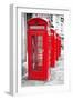 Row Of Iconic London Red Phone Cabins With The Rest Of The Picture In Black And White-Kamira-Framed Photographic Print