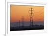 Row of Power Pylons at Sunset, Mid Canterbury, South Island, New Zealand-David Wall-Framed Photographic Print