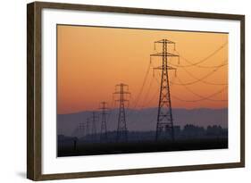 Row of Power Pylons at Sunset, Mid Canterbury, South Island, New Zealand-David Wall-Framed Photographic Print