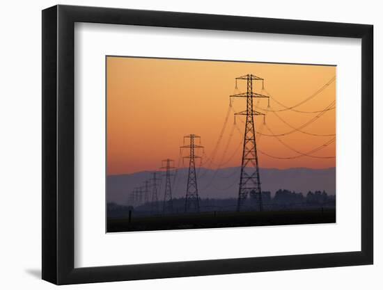 Row of Power Pylons at Sunset, Mid Canterbury, South Island, New Zealand-David Wall-Framed Photographic Print