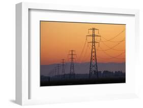 Row of Power Pylons at Sunset, Mid Canterbury, South Island, New Zealand-David Wall-Framed Photographic Print