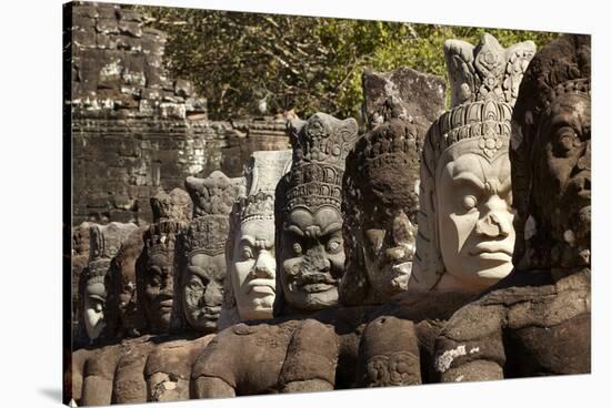 Row of Statues of Asuras on South Gate Bridge across Moat to Angkor Thom, Siem Reap-David Wall-Stretched Canvas