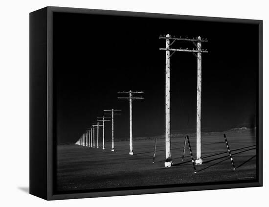 Row of Telephone Poles Along Bonneville Salt Flats-Fritz Goro-Framed Stretched Canvas