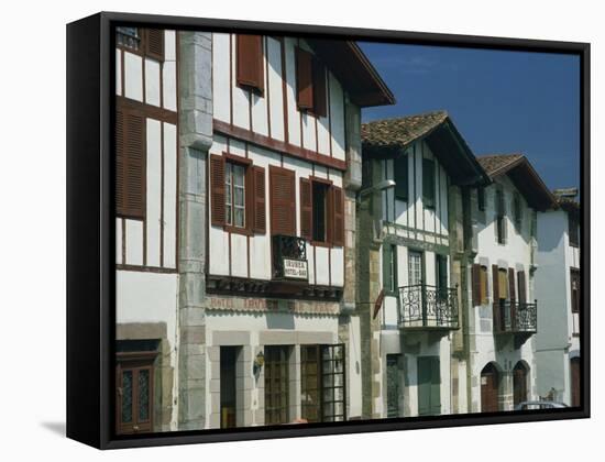 Row of Traditional Buildings in the Village of Ainhoa in the Pyrenees in Aquitaine, France-Michael Busselle-Framed Stretched Canvas