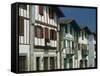 Row of Traditional Buildings in the Village of Ainhoa in the Pyrenees in Aquitaine, France-Michael Busselle-Framed Stretched Canvas