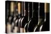 Row of Vintage Wine Bottles in a Wine Cellar (Shallow Dof; Color Toned Image)-l i g h t p o e t-Stretched Canvas