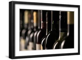 Row of Vintage Wine Bottles in a Wine Cellar (Shallow Dof; Color Toned Image)-l i g h t p o e t-Framed Photographic Print