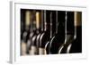 Row of Vintage Wine Bottles in a Wine Cellar (Shallow Dof; Color Toned Image)-l i g h t p o e t-Framed Photographic Print