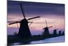 Row of Windmills at Sunrise in the Netherlands-Darrell Gulin-Mounted Photographic Print