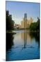 Rower on Chicago River with Skyline-null-Mounted Premium Photographic Print