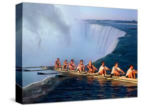 Rowers Hang Over the Edge at Niagra Falls, US-Canada Border-Janis Miglavs-Stretched Canvas