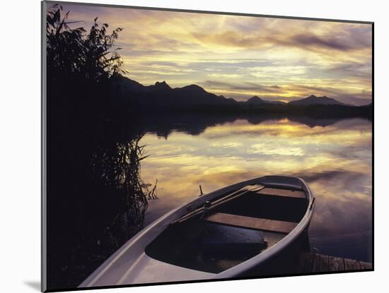 Rowing Boat on Hopfensee Lake at Sunset, Near Fussen, Allgau, Bavaria, Germany, Europe-Markus Lange-Mounted Photographic Print
