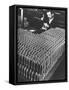 Rows of 15 cm Shells on Table Where Worker Uses Hammer and Stamping Tool at Skoda Munitions Factory-Margaret Bourke-White-Framed Stretched Canvas