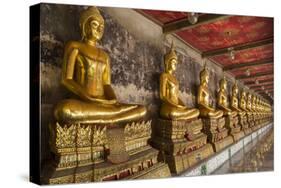 Rows of Gold Buddha Statues, Wat Suthat Temple, Bangkok, Thailand, Southeast Asia, Asia-Stephen Studd-Stretched Canvas