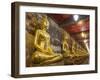 Rows of Gold Buddha Statues, Wat Suthat Temple, Bangkok, Thailand, Southeast Asia, Asia-Stephen Studd-Framed Photographic Print