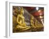 Rows of Gold Buddha Statues, Wat Suthat Temple, Bangkok, Thailand, Southeast Asia, Asia-Stephen Studd-Framed Photographic Print