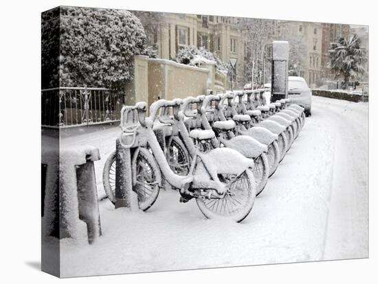 Rows of Hire Bikes in Snow, Notting Hill, London, England, United Kingdom, Europe-Mark Mawson-Stretched Canvas