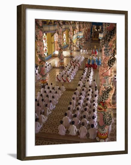 Rows of Monks at Prayer Inside a Temple of the Caodai Religious Sect, at Tay Ninh, Vietnam-Waltham Tony-Framed Photographic Print