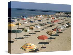 Rows of Open Beach Umbrellas Lining a Sandy Cape Cod Beach-Dmitri Kessel-Stretched Canvas