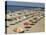 Rows of Open Beach Umbrellas Lining a Sandy Cape Cod Beach-Dmitri Kessel-Stretched Canvas