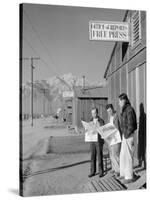 Roy Takeno, Editor, and Group, Manzanar Relocation Center, California-Ansel Adams-Stretched Canvas