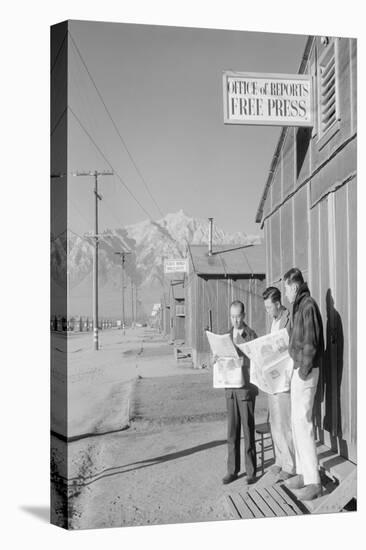 Roy Takeno (Editor) and Group Reading Manzanar Paper [I.E. Los Angeles Times] in Front of Office-Ansel Adams-Stretched Canvas