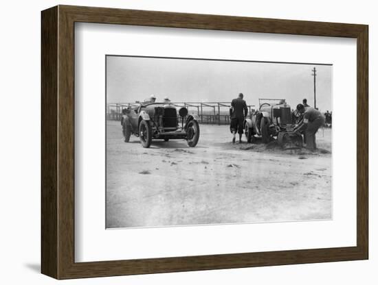 RSS Hebelers Lagonda passing R Childes crashed Lea-Francis, BARC 6-Hour Race, Brooklands, 1929-Bill Brunell-Framed Photographic Print