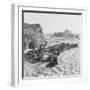 Rubber Soled Shoes in Rows on Beach-null-Framed Photographic Print