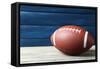 Rugby Ball on Wooden Background-Yastremska-Framed Stretched Canvas