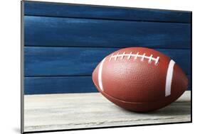 Rugby Ball on Wooden Background-Yastremska-Mounted Photographic Print