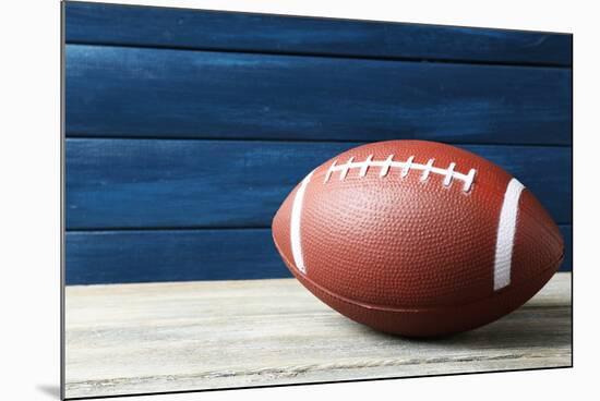 Rugby Ball on Wooden Background-Yastremska-Mounted Photographic Print