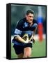 Rugby Player in Action, Paris, France-Paul Sutton-Framed Stretched Canvas