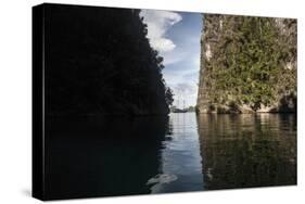 Rugged Limestone Islands Frame an Indonesian Pinisi Schooner-Stocktrek Images-Stretched Canvas