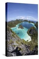 Rugged Limestone Islands Surround a Gorgeous Lagoon in Raja Ampat-Stocktrek Images-Stretched Canvas