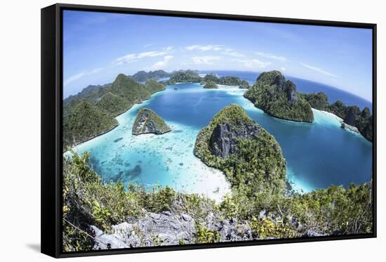 Rugged Limestone Islands Surround a Gorgeous Lagoon in Raja Ampat-Stocktrek Images-Framed Stretched Canvas