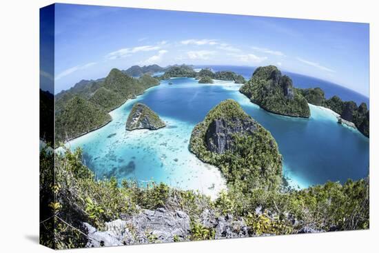 Rugged Limestone Islands Surround a Gorgeous Lagoon in Raja Ampat-Stocktrek Images-Stretched Canvas