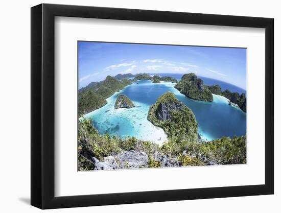 Rugged Limestone Islands Surround a Gorgeous Lagoon in Raja Ampat-Stocktrek Images-Framed Photographic Print