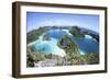 Rugged Limestone Islands Surround a Gorgeous Lagoon in Raja Ampat-Stocktrek Images-Framed Photographic Print